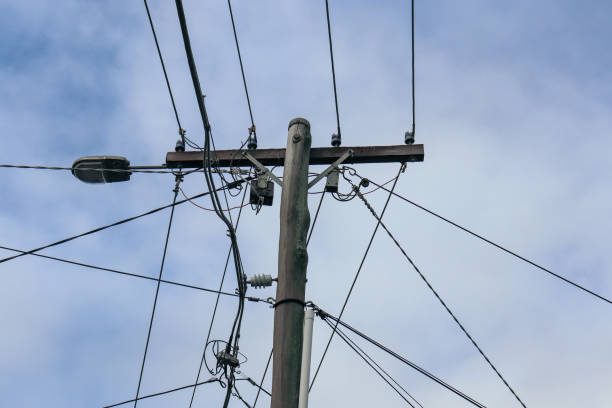 istock electricity lines against sky 1403192240