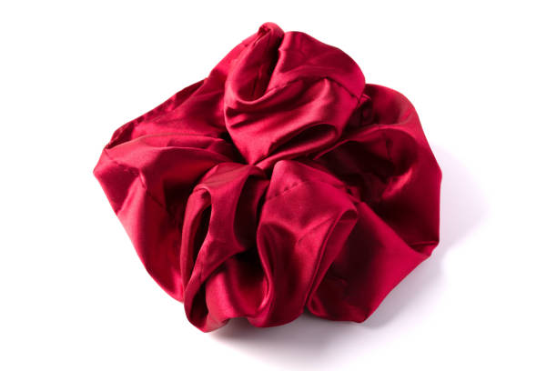 istock Dark red hair tie on white background 1403193832