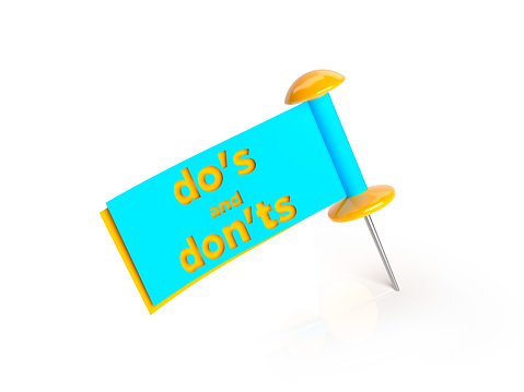 Orange color map pin, cyan, yellow color papers, and do's and don'ts text messages. On the white reflected surface. Isolated with clipping path.