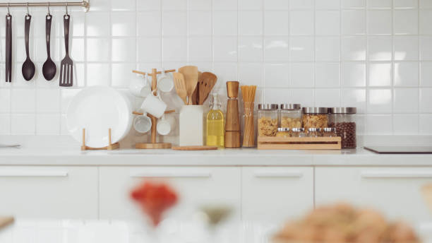 istock Kitchen accessories, kitchen wood utensils in white kitchen room, ss 1403201182