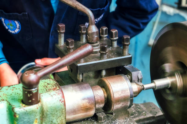 istock lathes and welders working in small industrial workshops 1403205464