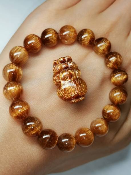 istock Copper Rutilated Quartz bracelet and brave troops 1403208509