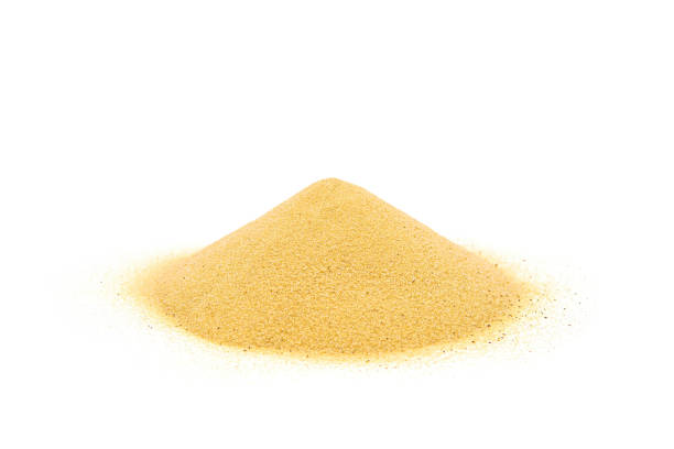 istock Small pile of sand isolated on white 1403208522