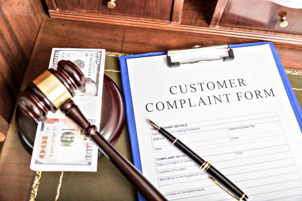 istock Close up on a file tab with the word complaints, focus on the main text and blur effect. Concept image for illustration of Customer Service complaint management. 1403211150