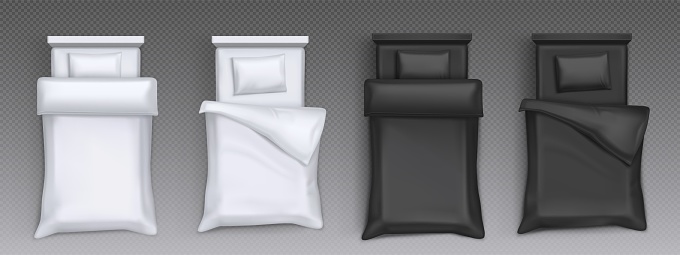 Unmade beds with white and black bedclothes