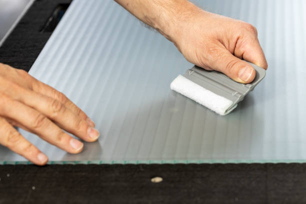 istock covering the glass with decorative foil 1403211664