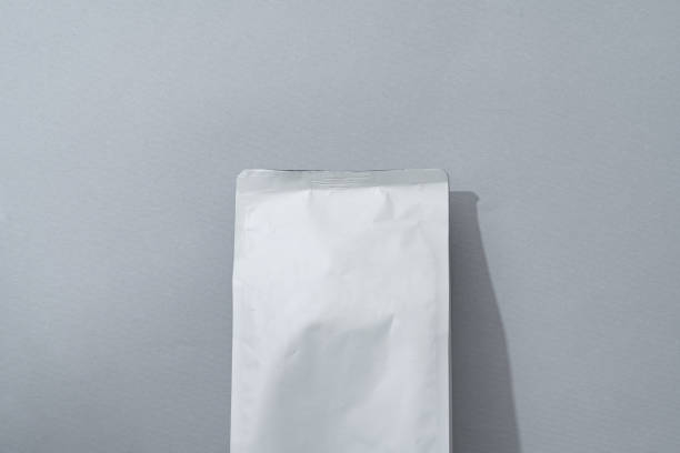 istock White blank matte coffee package on paper background 1403212571