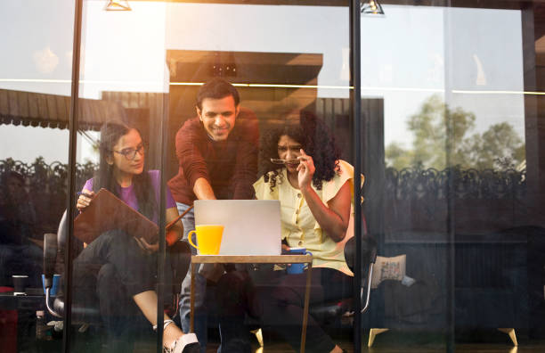 istock Business colleagues working at coffee shop 1403213446