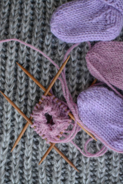 istock Small newborn socks, made of soft alpaca wool yarn 1403215087