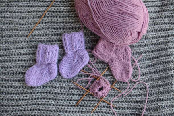 istock Small newborn socks, made of soft alpaca wool yarn 1403215121