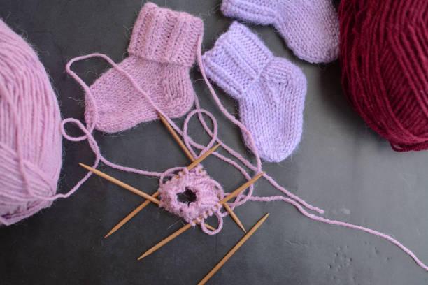 istock Small newborn socks, made of soft alpaca wool yarn 1403215134