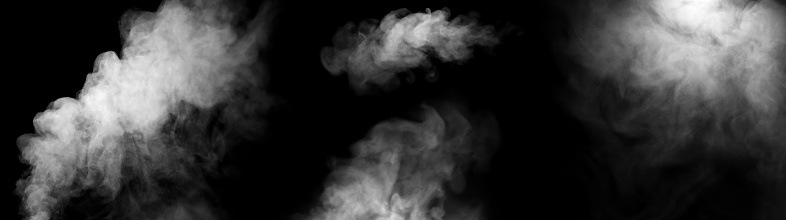 Set. Close-up of steam or mist. Abstract white smoke floating in the air. Visible water droplets swirled. isolated on a black background