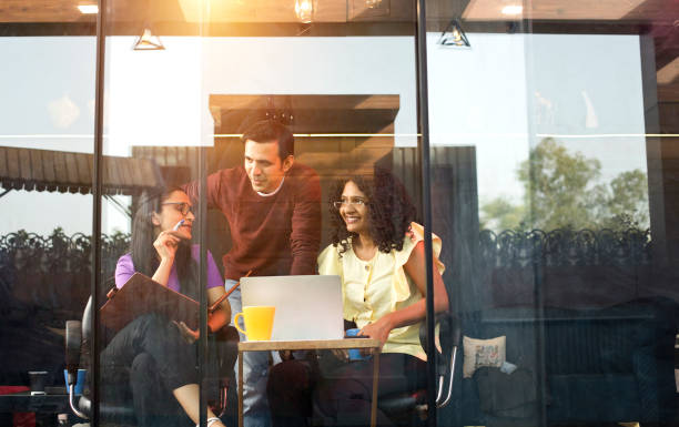 istock Business colleagues working at coffee shop 1403217773