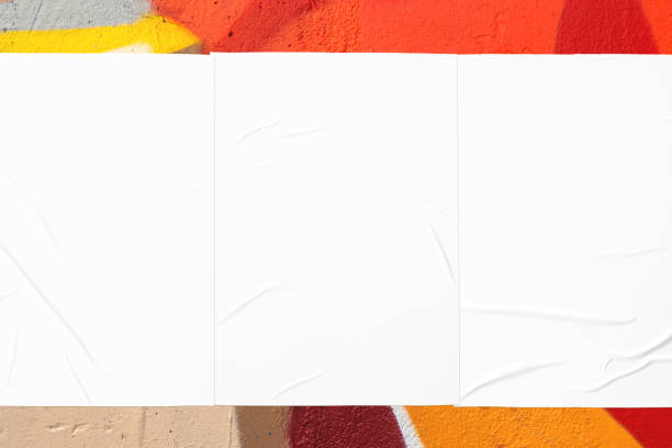 istock colorful urban wall texture with three wrinkled glued poster templates 1403220353