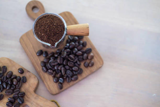 istock Coffee beans and ground powder 1403223240