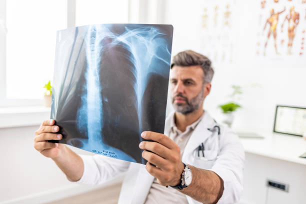 istock Doctor checking X-Ray in a modern hospital. 1403226820