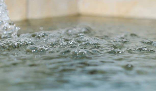 istock Wavy water due to filling 1403233878