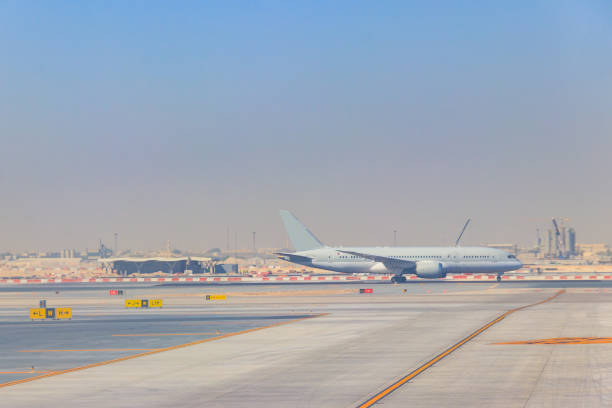 istock Airplane on runway in Doha airport, Qatar 1403241404