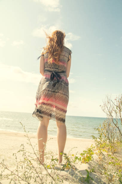 istock woman at sea 1403244046
