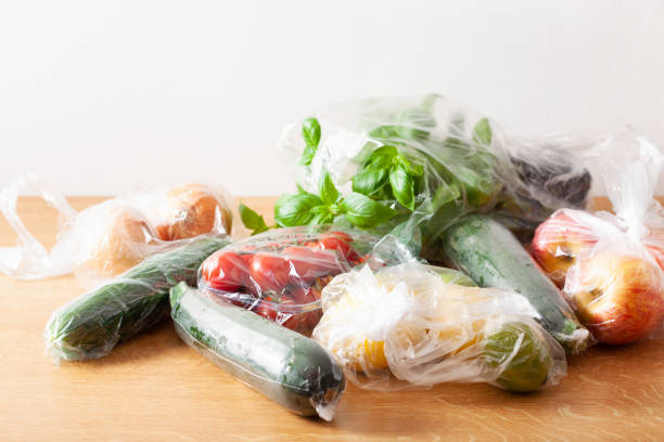 istock single use plastic waste issue. fruits and vegetables in plastic bags 1403244243