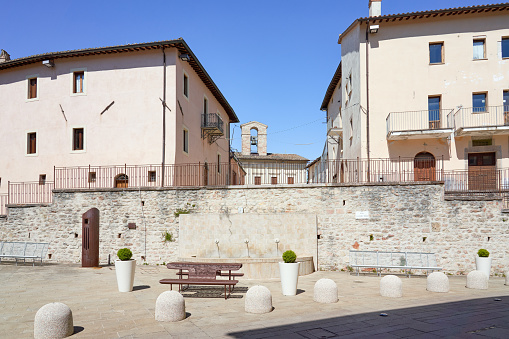 Town square in a medieval village in Perugia Province.
