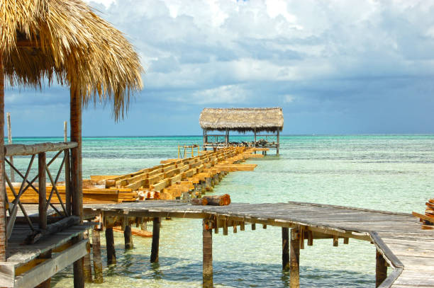 istock Wooden pier in construction with relaxing bohio 1403245586