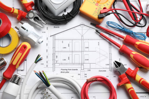 istock Set of electrician's tools and accessories on house plan, flat lay 1403247168
