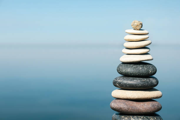 istock Stack of stones near sea, space for text. Harmony and balance concept 1403248724
