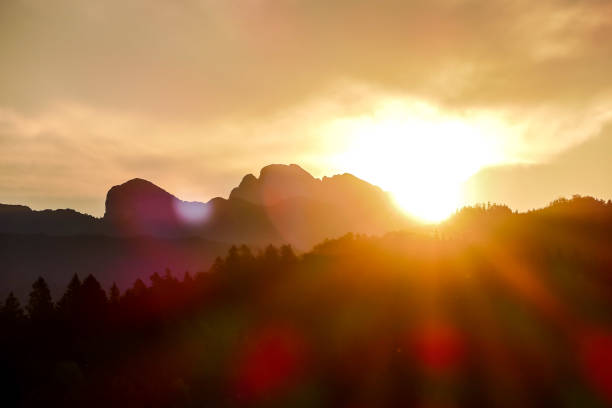 istock sunset in mountains, digital photo picture as a background 1403248974