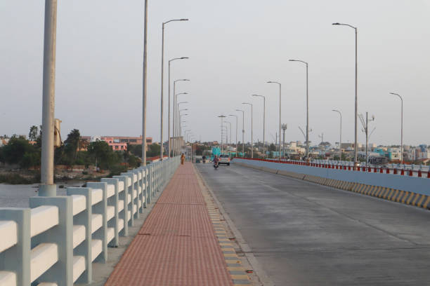 Road with beautiful view on road and diu and ghoghla connect bridge. or Diu ghoghla bridge. electricity pole on bridge. road of Diu located in Diu district of Union Territory Daman and Diu, India. Road with beautiful view on road and diu and ghoghla connect bridge. or Diu ghoghla bridge. electricity pole on bridge. road of Diu located in Diu district of Union Territory Daman and Diu, India. diu island stock pictures, royalty-free photos & images