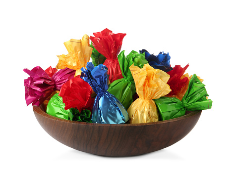 Muti-Colored Gum Drops candy in a glass candy dish against a white background