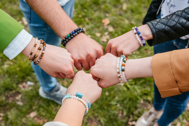 istock Friends Wearing Friendship Bracelets 1403251403