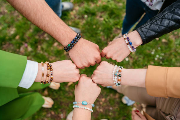 istock Friends Wearing Friendship Bracelets 1403252069