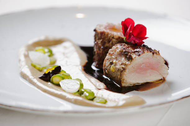 istock Medium rare beef with fava bean puree and soy sauce 1403252083
