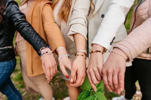 istock Friends Wearing Friendship Bracelets 1403252160