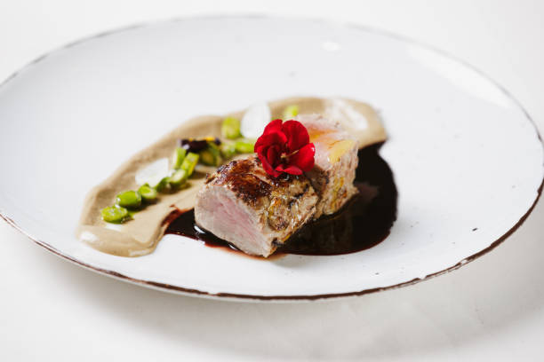 istock Medium rare steak with fava bean puree and soy sauce 1403252252