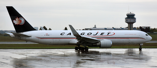 CARGOJET Taxiing To Runway For Departure Scene At Ottawa International Airport Ontario Canada