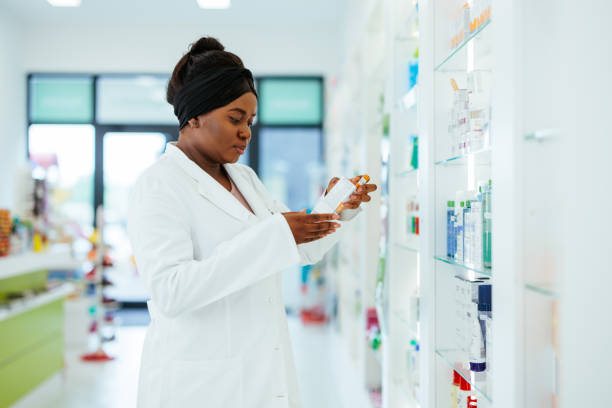 istock Pharmacist studying medical product in pharmacy 1403257937