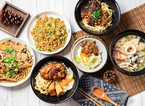 Assorted noodle soup, Pork Knuckle rice Bento, Chili Sauce Noodles, Shredded Pork Fried Rice, Dayang Chun Noodles Dry, Fried Pork Rice, in a dish isolated on wood table side view taiwan food