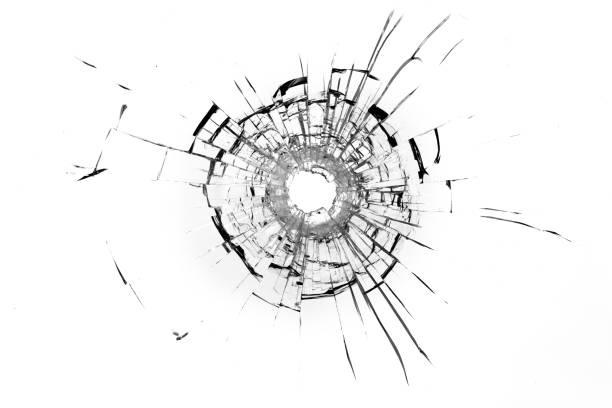 istock Bullet hole in the rock. Broken window, cracks. 1403268166