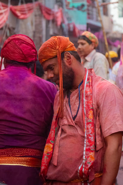 local people celebrating lathmar holi festival at barsana - 5461 imagens e fotografias de stock