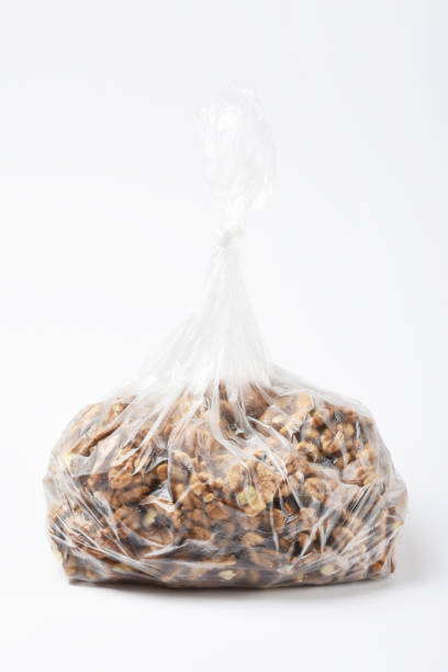 istock Peeled walnuts in the plastic bag on the white background 1403277684