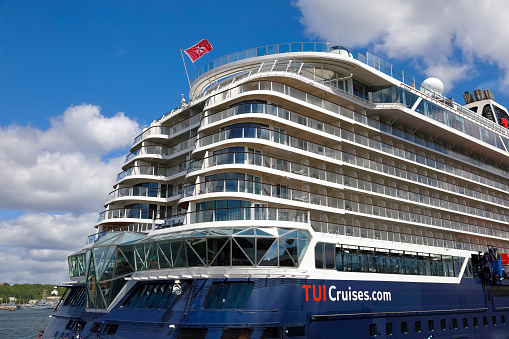 Gdynia, Poland - May 27, 2022: A cruise ship named Mein Schiff 1 stopped in the port of Gdynia on a sunny day. This modern ship was put into operation in 2018 and its length is almost 316 meters.