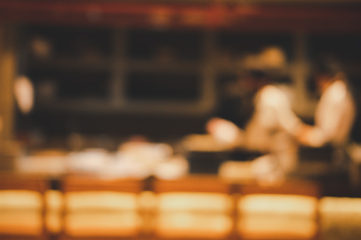 Blur image of Japanese chef making food in kitchen for background usage