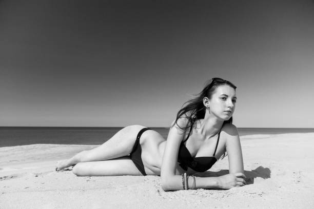 istock beautiful girl tanning 1403287009