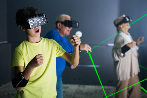 istock Family using virtual reality glasses delighted with videogames 1403288656