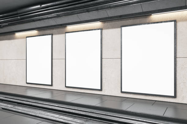 istock Perspective view on blank white posters on light grey wall with place for your logo or text behind rails in abstract empty underground area. 3D rendering, mockup 1403289778