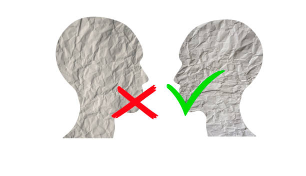 istock Two heads made of paper 1403290011