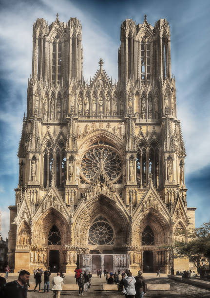 REIMS, FRANCE - OCTOBER 15, 2021: The imposing Gothic cathedral of Reims is a historic landmark as kings of France were coronated there.