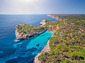 istock Arial View of Calo des Moro (instagram beach) , Cala s'Almunia and Peninsula of Castellet de Llevant on east coast near by Cala Llombards and Santanyí on Spanish Balearic island of Majorca / Spain 1403293277